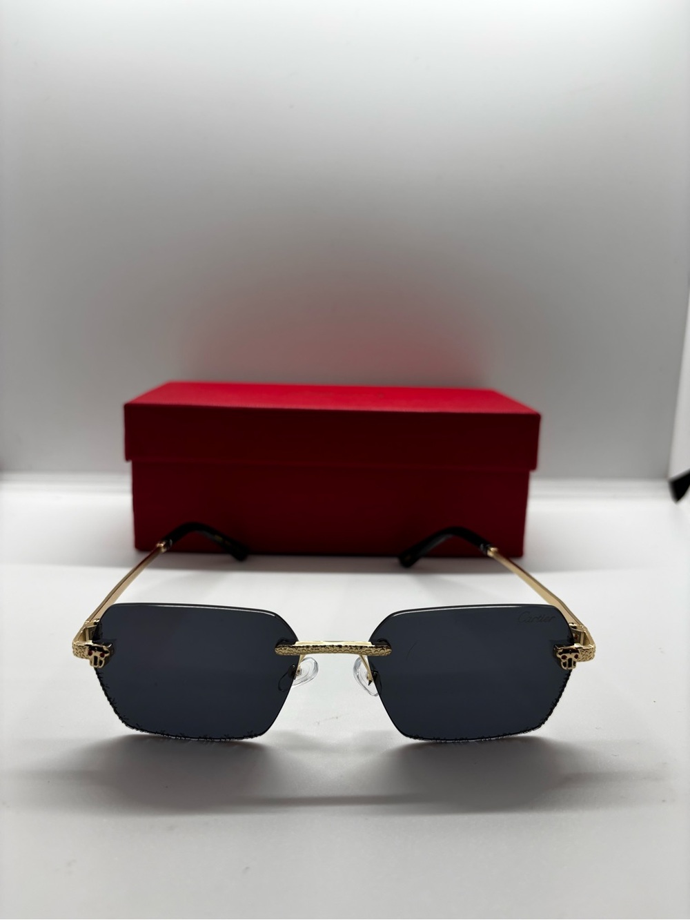 Gold Frame Rimless Sunglasses with Dark Lenses